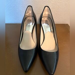 Michael Kors 7M black pumps.
